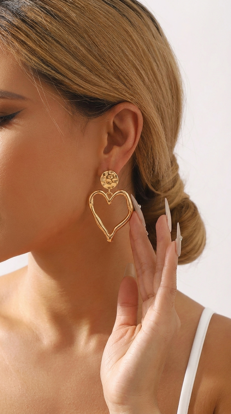 Coeur | Boucles d'oreilles statement cœur ajourné